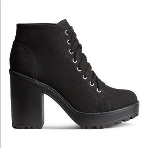 Black rubber heeled boots!!